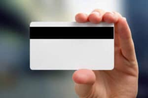 holding a magnetic stripe key card